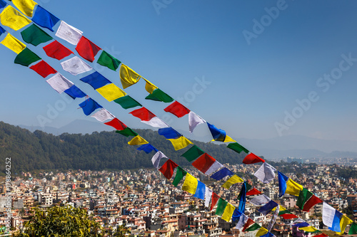 Buddhist prayer flags against the backdrop of the Kathmandu valley