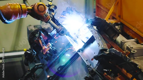 Industrial robot welding metal