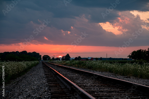 Sunset over Railroad Tracks in Country