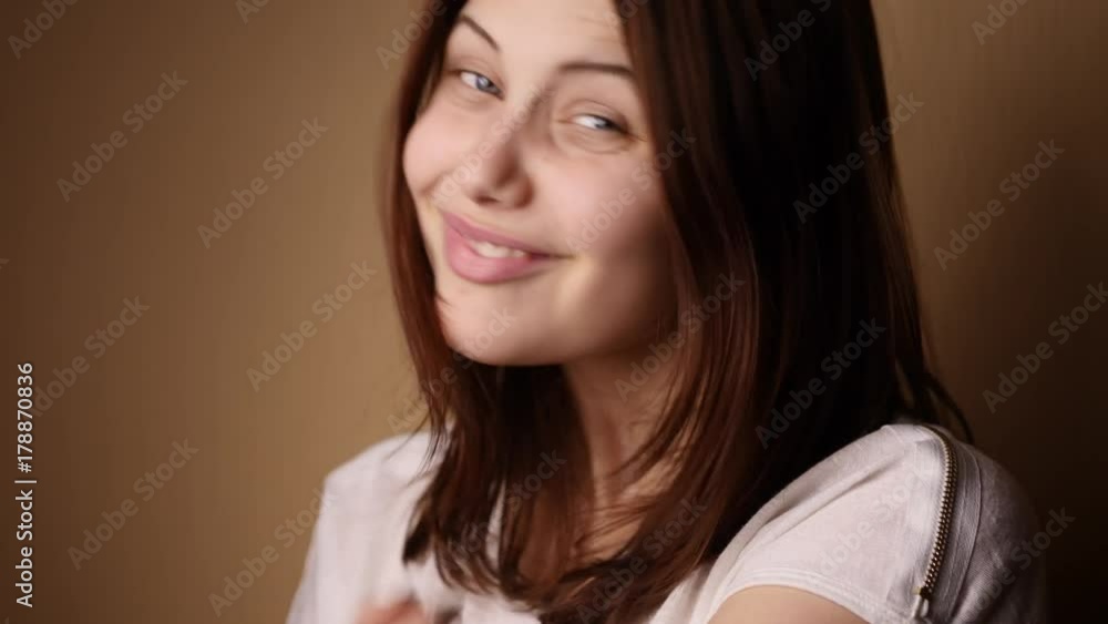 Unhappy Teen Girl do not give a damn and shows a bad gesture. Unhappy Teen Girl do not give a damn and shows a bad gesture.