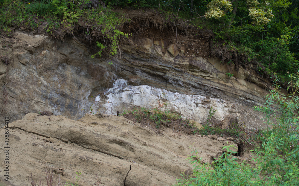 Scree large pieces of clay bank of the river Scree large pieces of clay bank of the river