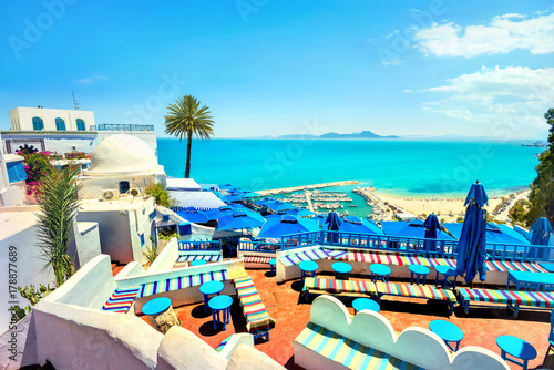 Fototapeta Top view of seaside and terrace of cafe in Sidi Bou Said