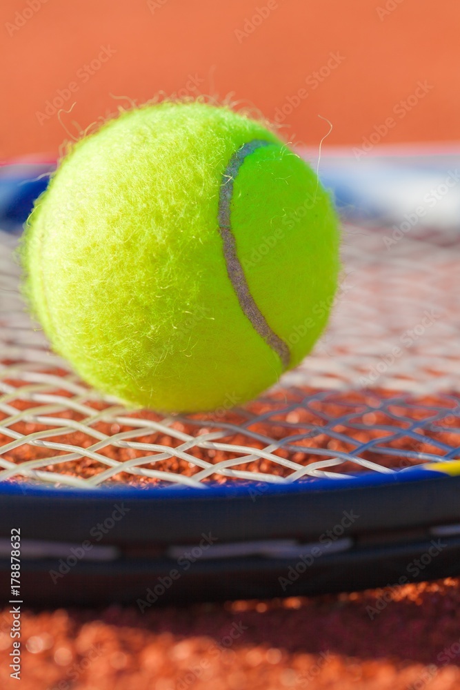 Tennis Racket and Ball on a Tennis Court