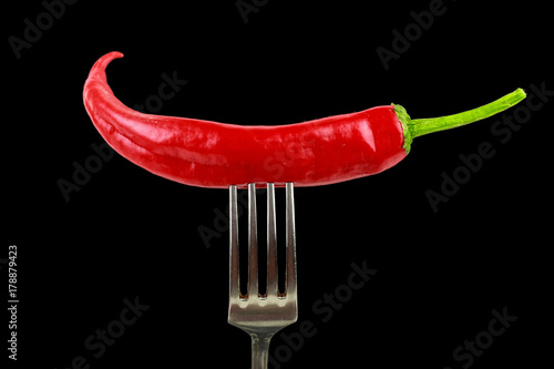 red hot chili pepper on the fork