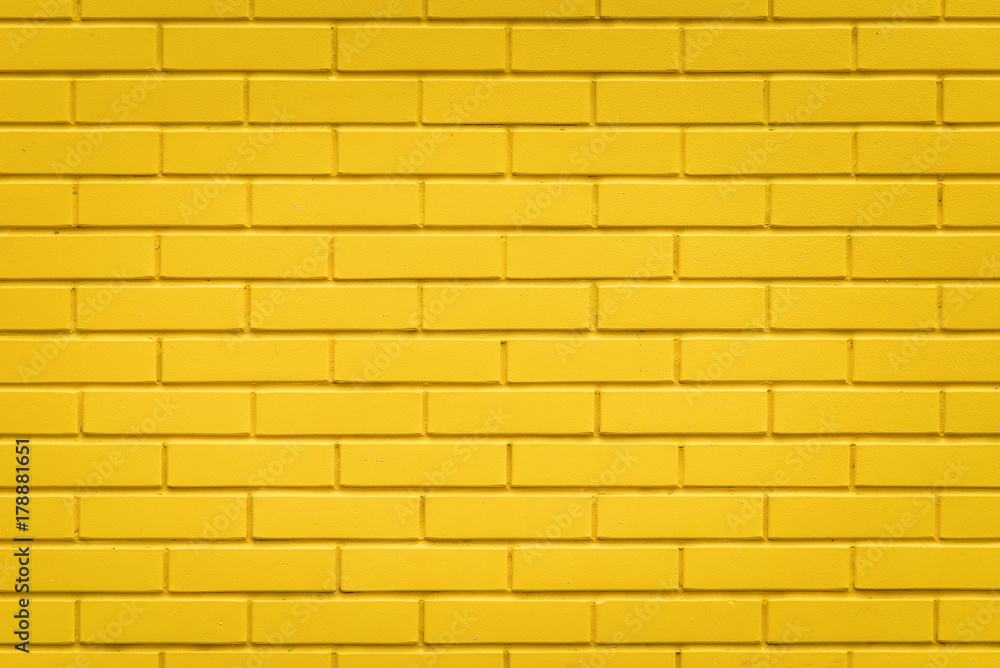 Fototapeta premium Żółty ściana z cegieł tekstury tło, horyzontalny wzór