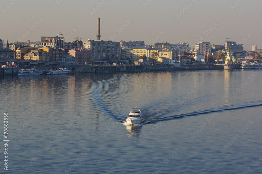 Boat floats down the river Dnieper. Kiev, Ukraine