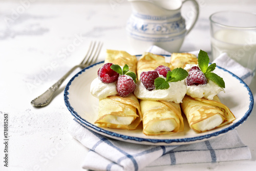 Crepes stuffed with ricotta.