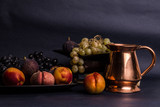 Still life art photography with books fruits on table