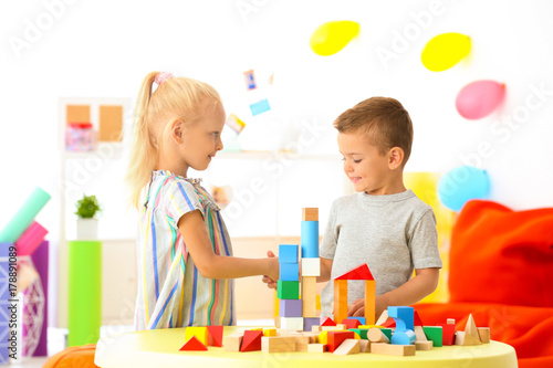 Cute children playing with ...