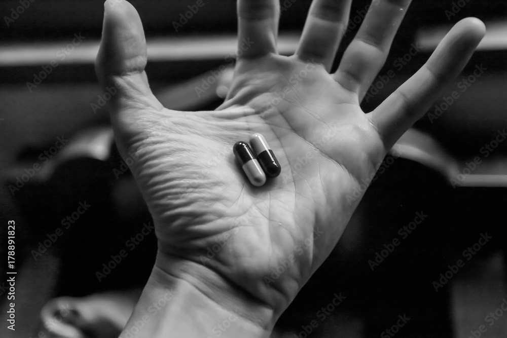 Medicine pills or capsules in hand, palm or fingers. Drug prescription for treatment medication, Health Care Concepts