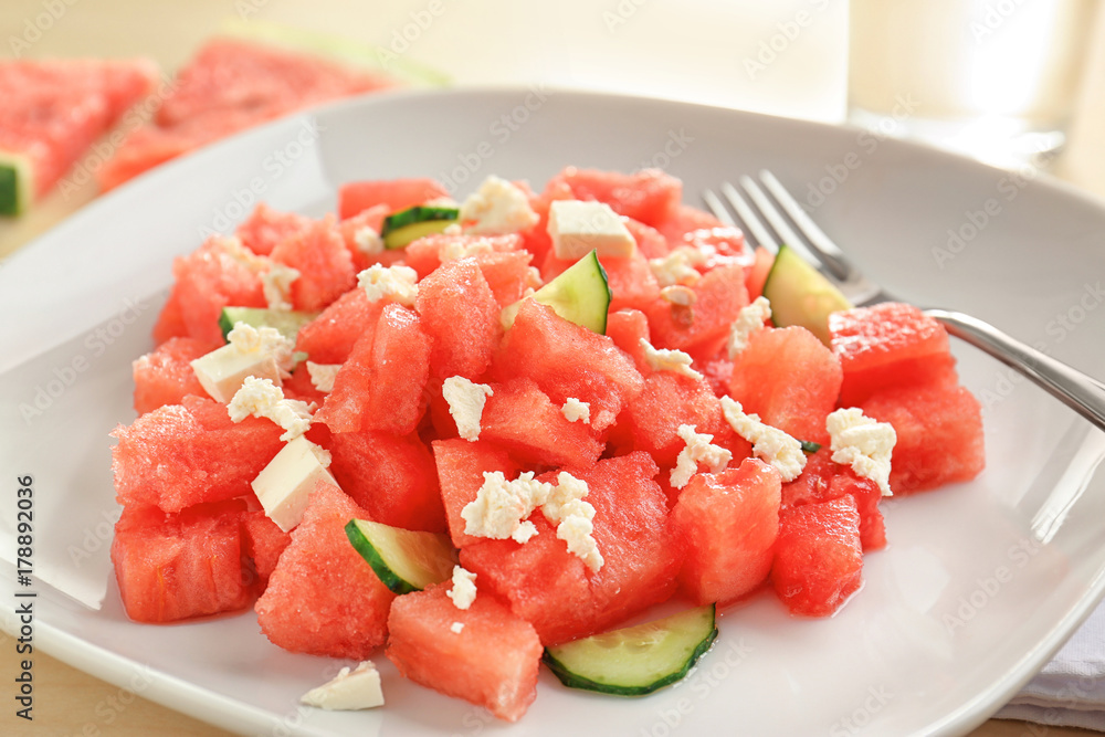 Fresh salad with watermelon on plate, closeup Fresh salad with watermelon on plate, closeup