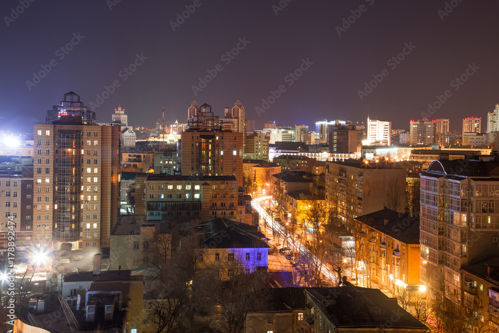 Night panoramic aerial winter cityscape view of Voronezh city, houses, night lights