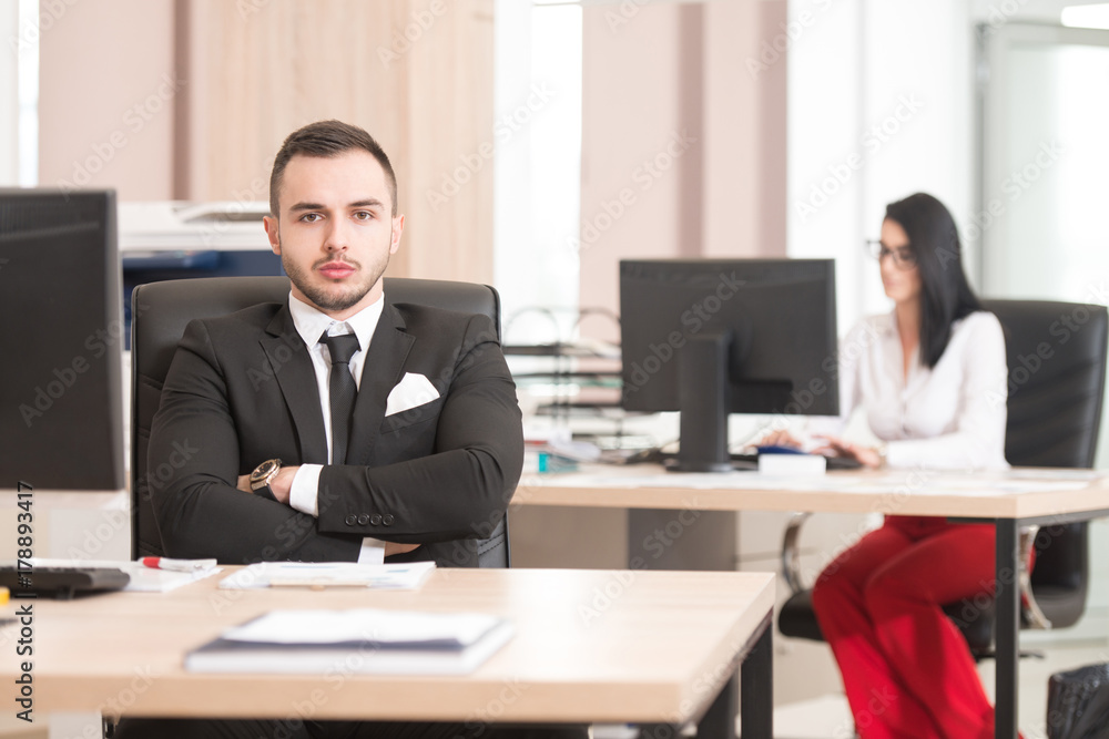 Businesswoman And Businessman Looking At Computer Businesswoman And Businessman Looking At Computer