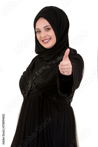 Muslim woman in black dress isolated on white