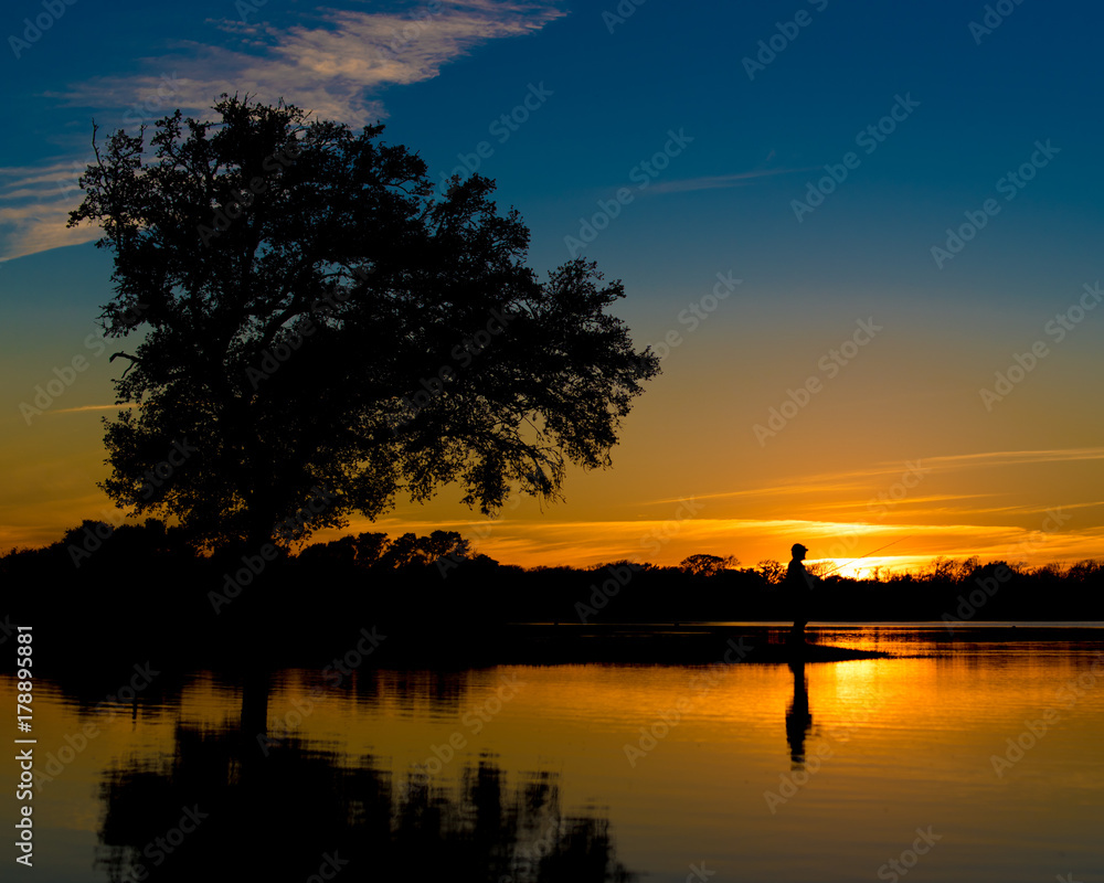 man fishing sunrise