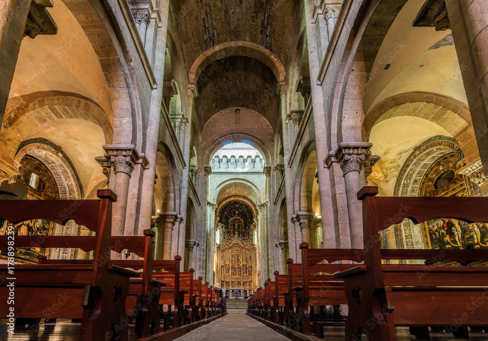 Interior of the Old Cathedral of Coimbra, a.k.a. Se Velha, a Romanesque Roman Catholic building, started in 12th century. Coimbra, Portugal.