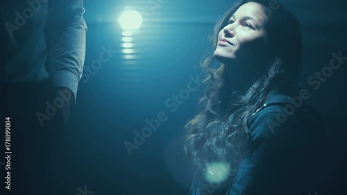  Woman in police custody being interrogated by aggressive cop