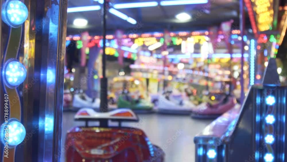 Electric bumper cars or dodgem cars at amusement park Electric bumper cars or dodgem cars at amusement park