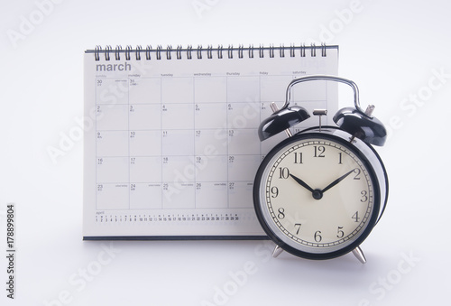 alarm clock with calendar. alarm clock with calendar on the background.