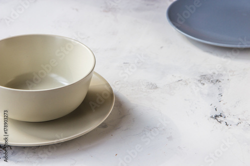Ceramic plates on a white background close up © allenkayaa