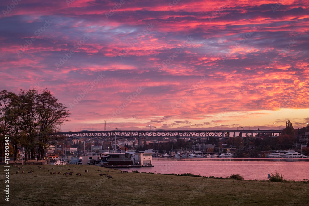 Colorful clouds light up the sky over Lake Union on a fall morning