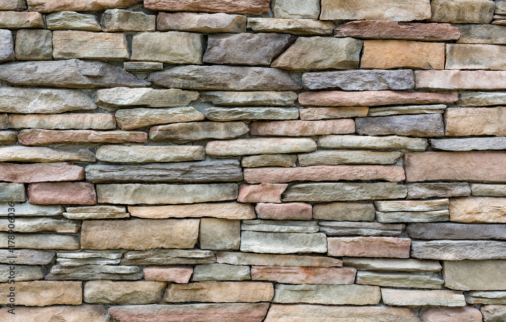 Pattern of decorative stone wall surface for background.