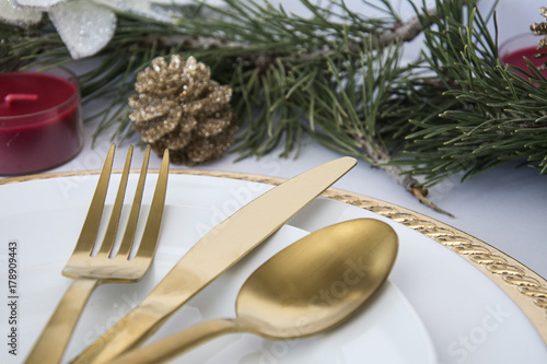 gold and white christmas table setting photo