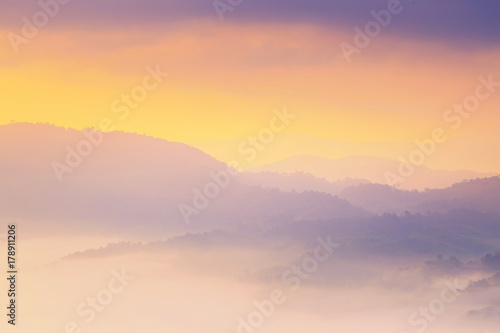 Sunshine and clouds on the morning mist At Phu Lang Ka, Phayao, Thailand © PRASERT