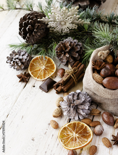New Year or Christmas composition with walnuts, mulled wine wood background, selective focus