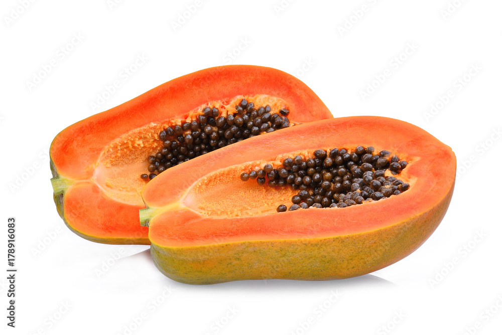 half of ripe papaya fruit with seeds isolated on white background half of ripe papaya fruit with seeds isolated on white background