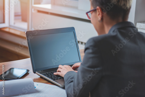 Businesswoman working on a laptop 