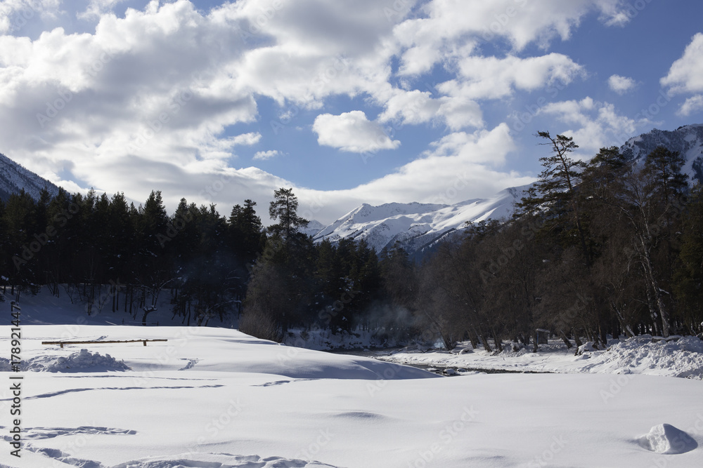 Winter panorama of the mountain with valleys and forest. Winter panorama of the mountain with valleys and forest.