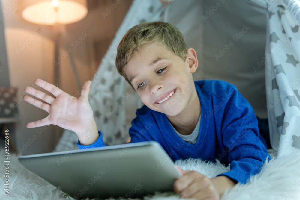 Attractive kid having video call Attractive kid having video call