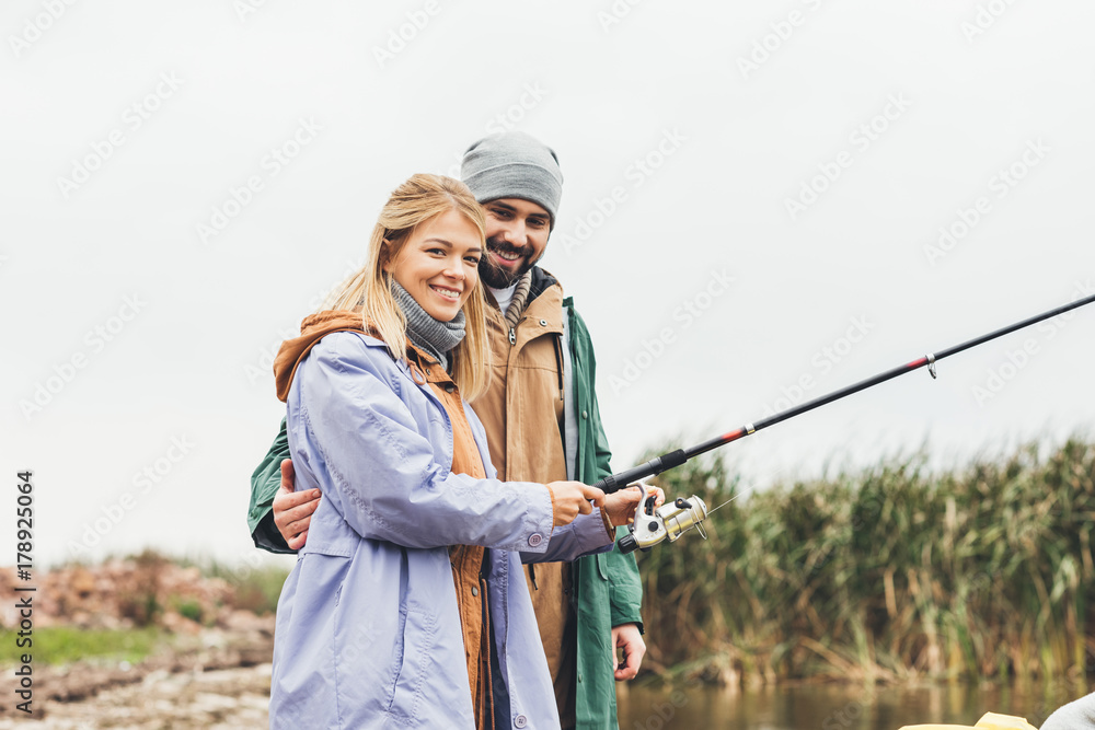 couple fishing together couple fishing together