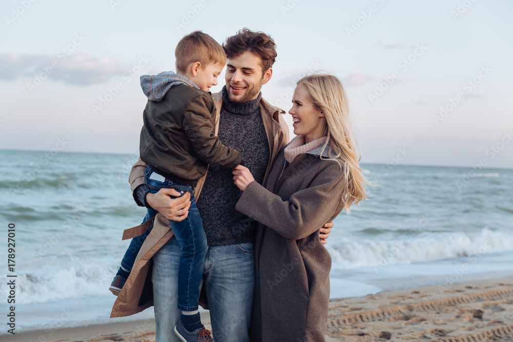 family with son at seaside