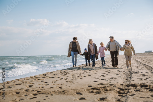 family on beach at seaside