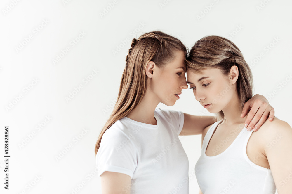 woman hugging girlfriend woman hugging girlfriend