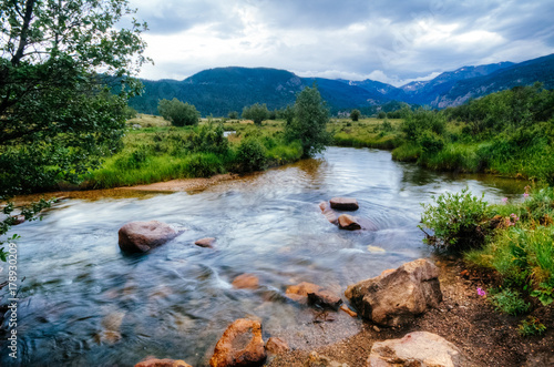 A stream runs down from the Rocky Mountains.