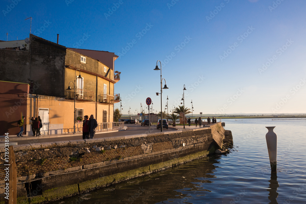 Lesina (Puglia, Italy) - View of the little village and its coloured houses in the sunset
