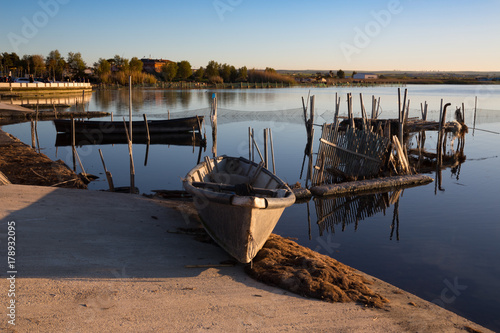 Lesina (Puglia, Italy) - View of the lake and boats in the sunset
