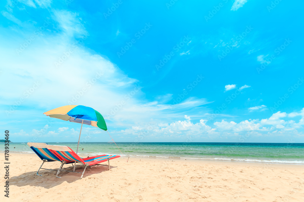 Ka-ron Beach at Phuket , Thailand. White sand beach with beach umbrella. Summer, Travel, Vacation and Holiday concept.