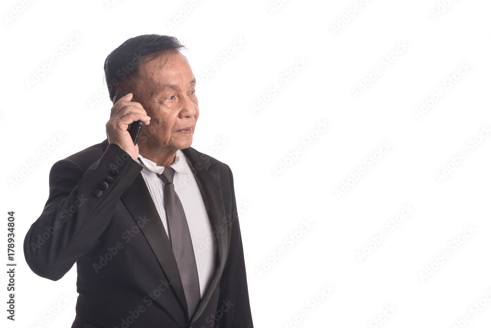 Portrait of senior businessman using mobile phone isolated on white background. Business Leader Using Smartphone in studio. Feee from copy space. Portrait of senior businessman using mobile phone isolated on white background. Business Leader Using Smartphone in studio. Feee from copy space.
