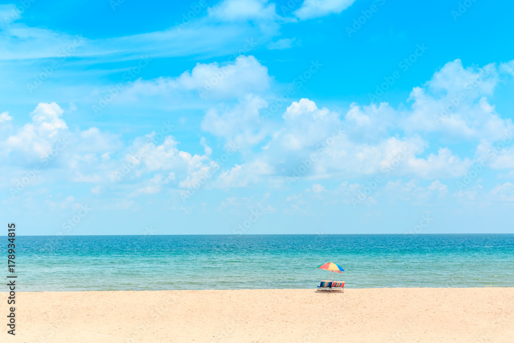 Ka-ron Beach at Phuket , Thailand. White sand beach with beach umbrella. Summer, Travel, Vacation and Holiday concept.