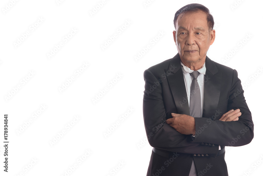Confident businessman, Close up businessman in black suit posing with arms crossed isolated on white background and free copy space. Confident businessman, Close up businessman in black suit posing with arms crossed isolated on white background and free copy space.