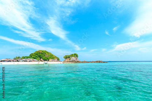 Kai island, Phuket, Thailand. Small tropical island with white sandy beach and blue transparent water of Andaman sea.