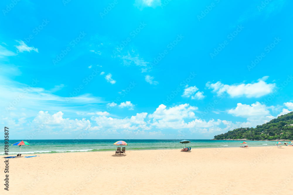 Ka-ron Beach at Phuket , Thailand. White sand beach with beach umbrella. Summer, Travel, Vacation and Holiday concept.