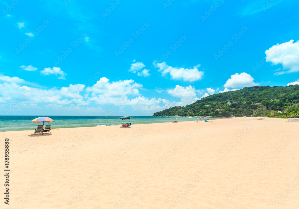 Ka-ron Beach at Phuket , Thailand. White sand beach with beach umbrella. Summer, Travel, Vacation and Holiday concept.