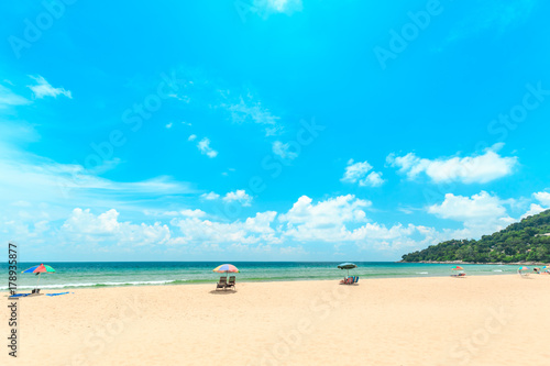 Fototapeta Naklejka Na Ścianę i Meble -  Ka-ron Beach at Phuket , Thailand. White sand beach with beach umbrella. Summer, Travel, Vacation and Holiday concept.