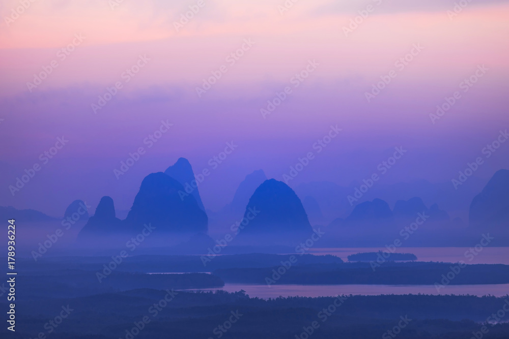 Landscape of sunrise at   limestone karsts in Phang-nga bay at sunrise. Unseen place of 