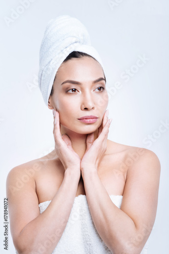Beautiful woman posing in towel after bath